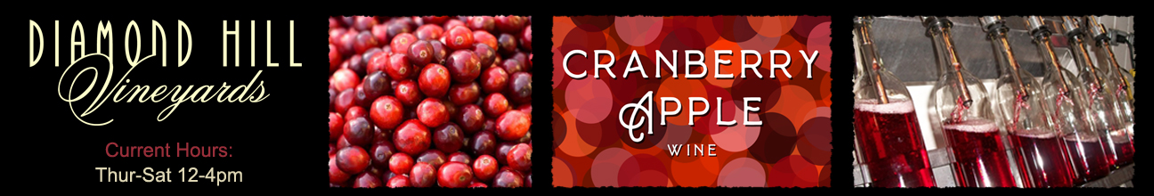 Close up of fresh cranberries, Detail from the wine label, Cranberry Apple wine being bottled in the winery.